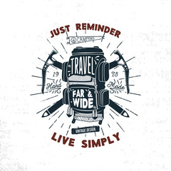 Fototapeta premium Vintage hand drawn camper backpack badge design with words - travel far and wide. Retro silhouette rucksack symbol. Perfect for t shirt, poster print. Stock isolated on white background