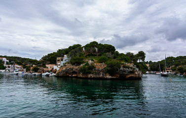 Picturesque small harbor in the south of Mallorca, Balearic islands, Spain. Mediterranean seascape.