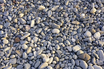 Pebble stones on the beach in Nice, French Riviera, France