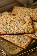 brown crackers topped with seeds