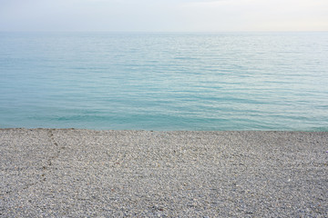 Pebble stones on the beach in Nice, French Riviera, France