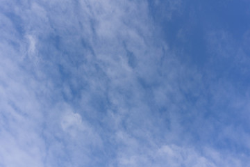 White feathered clouds in the blue sky Beautiful sky background with cirrus clouds