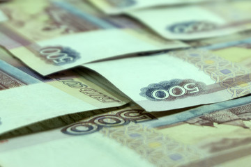 500 russian rubles banknotes on wooden background. Top view .