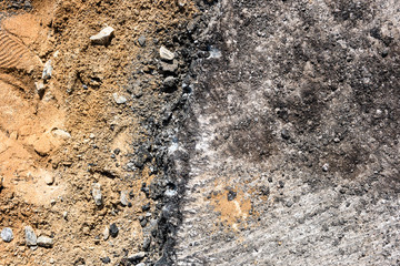 Sand and gravel is in half from above