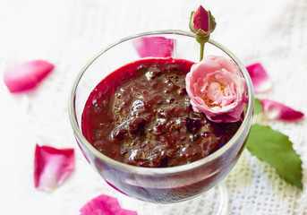 aromatic sweet red jam from roses on top