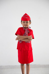 Obraz premium kid with flight attendant stewardess uniform