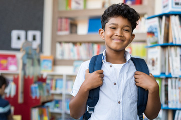 Smiling hispanic boy at school - Powered by Adobe