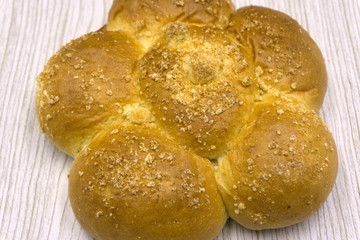 buns made as flower or snails family. Freshly baked sweet buns or bread rolls with black sweet poppy as best .