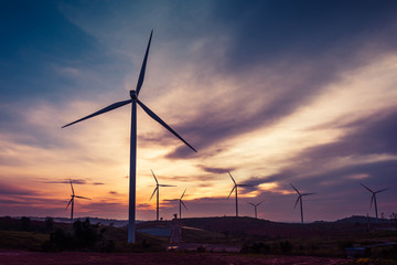 Obraz premium Wind turbine power generators on mountain