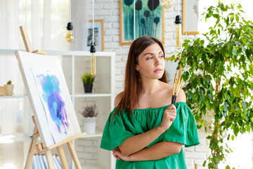 Creative woman working in art studio