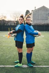 Portrait of female football players