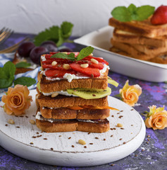French toast with cottage cheese, strawberries, kiwi a
