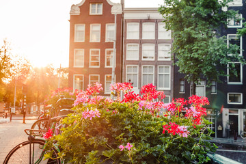 sunrise on the streets and canals of amsterdam