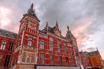 sunrise over the train station of Amsterdam