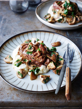 Fillet steak with mushrooms and cauliflower and horseradish mash, close-up