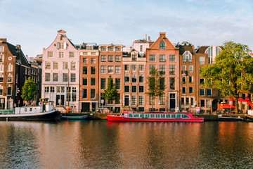 sunrise on the streets and canals of amsterdam