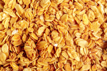 Homemade roasted granola on baking sheet breakfast food background