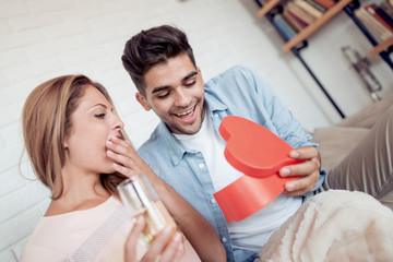 Obraz na płótnie Canvas Happy couple having romantic date at home