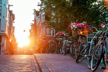 sunset on the streets and canals of Amsterdam