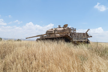 Fototapeta premium Destroyed Israeli tank is after the Doomsday (Yom Kippur War) on the Golan Heights in Israel, near the border with Syria