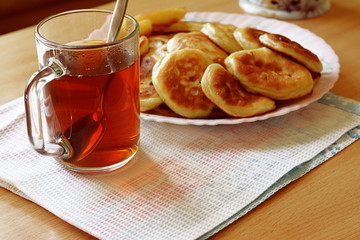 tea and fritters on a plate