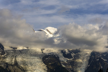 Mont Blanc among the clouds. Alps.