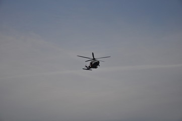 Fototapeta na wymiar Helicopter saving people