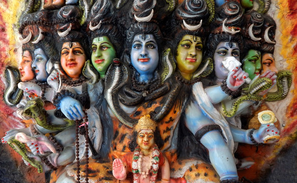 Closeup of Wall art Statue of Hindu God Shiva and Kumara swamy in a temple