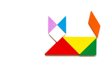 Color wood tangram puzzle in cat shape on white background