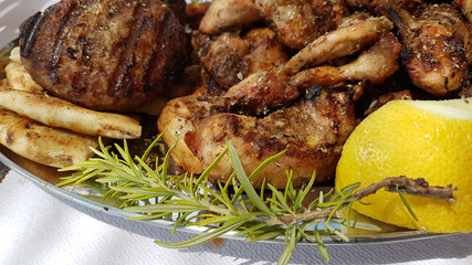 meat roasted various pieces, lemon rosemary