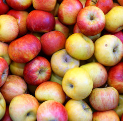 background of ripe yellow and red apples