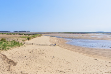 Sandy beach along the estuary at Wells-next-the-Sea on the Norfolk coast.