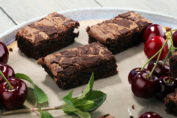 homemade chocolate brownies on rustic table. brownie bakery.
