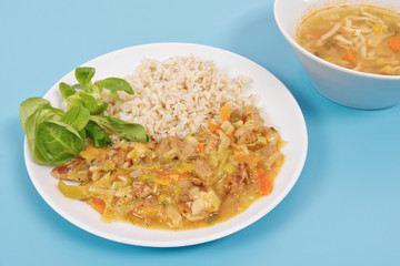 China of soy noodles and leek with rice on a white