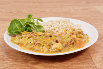 China of soy noodles and leek with rice on a white