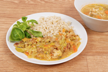 China of soy noodles and leek with rice on a white