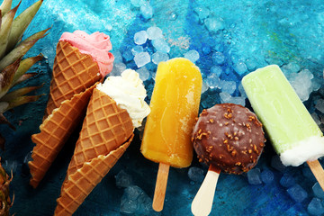 Vanilla frozen yogurt or soft ice cream in waffle cone.