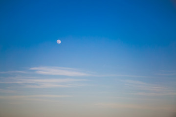 Blue full moon on daylight