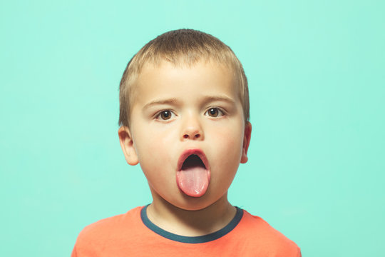 Child Sticking Out His Tongue