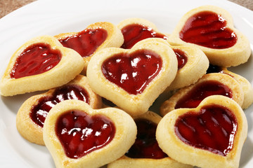 Heart shaped Valentines Day cookies with jam. Shaped biscuit cookie