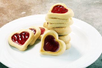 Heart shaped Valentines Day cookies with jam. Shaped biscuit cookie