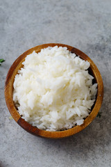 Top view image of cooked jasmin rice on metallic background
