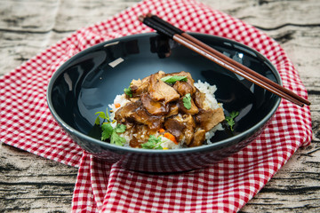 Vietnamese style caramel pork with rice and vegetable