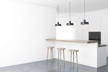 White kitchen corner with a bar