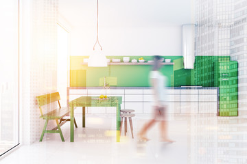 Green bench dining room and kitchen interior blur