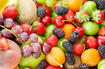 Fresh colorful  fruits background.Healthy eating, dieting concept,