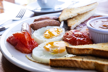 Egg and Toast - classical english breakfast with egg and ham