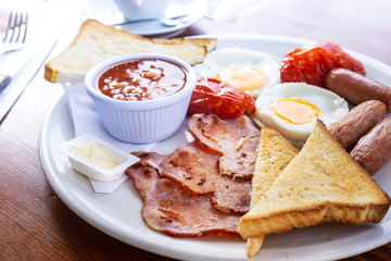 Egg and Toast - classical english breakfast with egg and ham