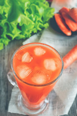 Carrot juice with ice carrot and lettuce in the early morning the view from the top.
