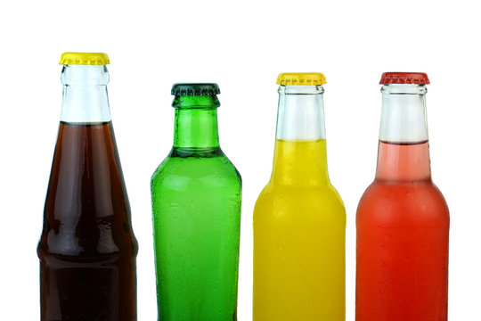 Colorful cold soda drinks on white background.
